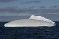 ANTARCTICA ICEBERG WITH PENGUINS