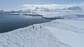 Antarctica landscape, penguins starting to swim. Royalty Free Stock Photo