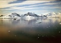 antartic icebergs floating on the sea from aerial point of view in panoramic