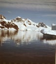 antartic icebergs floating on the sea from aerial point o f view in panoramic view Royalty Free Stock Photo