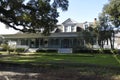 Antebellum Home in Louisiana against a blue sky