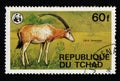 Antelope in savannah on postage stamp. Vintage stamps