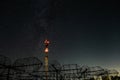 Antenna array of radio astronomy telescope on background of starry dark night sky Royalty Free Stock Photo