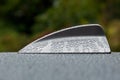 The antenna on a BMW 525, f11 whit raindrops