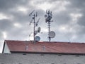 Antenna on a brown roof on a sunny day