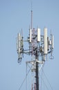 Antenna cellular signal mobile phone tower in blue sky