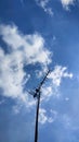 antenna photo above the blue sky with clouds