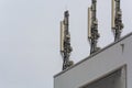 Antenna, telecommunications tower on a roof Royalty Free Stock Photo