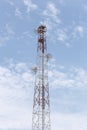 Antenna for Telephone communications in bright sky day time. Royalty Free Stock Photo