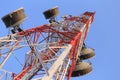 Antenna for Telephone communications in bright sky day time. Royalty Free Stock Photo