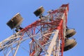 Antenna for Telephone communications in bright sky day time. Royalty Free Stock Photo