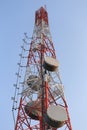 Antenna for Telephone communications in bright sky day time. Royalty Free Stock Photo