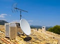 Antenna on a Tile Roof Royalty Free Stock Photo