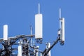 Antenna tower, with the blue sky. Close-up of the Communication antenna building with the sky background. Royalty Free Stock Photo