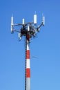 Antenna tower, with the blue sky. Close-up of the Communication antenna building with the sky background. Royalty Free Stock Photo