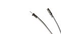 Antenna and TV cord with copy space. PAL antenna cable, plug, antenna cord, type F, coaxial cable. Isolated over white background