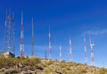 Antennae on hillside Royalty Free Stock Photo