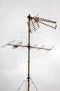 Antennas on a Roof over a Cloudy Royalty Free Stock Photo