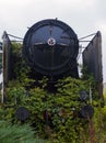 Anterolateral view of abandoned steam locomotive Royalty Free Stock Photo