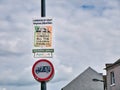 An anti abortion - pro-life message from the Irish Aontu political party on a placard fixed to a lamp post in Armagh