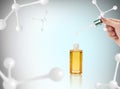 Anti-aging cosmetics oil for skin among molecules.