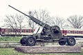 Anti-aircraft machine gun and train in motion Royalty Free Stock Photo