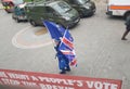 An anti-Brexit protester with both the EU and UK flags.