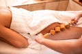 Anti-cellulite massage with special wooden roller Royalty Free Stock Photo
