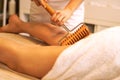 Madero Therapy massage done with specially designed wooden rolling-pins Royalty Free Stock Photo