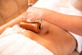 Anti-cellulite treatment with wooden instruments and tools Royalty Free Stock Photo