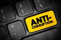 Anti-Corruption - comprises activities that oppose or inhibit corruption, text button on keyboard, concept background