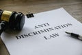 Anti discrimination law. Equality and human rights concept.Court scene judgement attorney. Document and gavel on wooden table Royalty Free Stock Photo