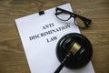 Anti discrimination law. Equality and human rights concept.Court scene judgement attorney. Document and gavel on wooden table Royalty Free Stock Photo