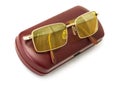 Anti-glare yellow driver`s glasses on the red case Royalty Free Stock Photo