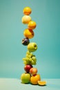 Anti-gravity balance assymetric unstable balancing structure of fruits levitating in slowmoton on top of each other