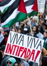 Anti-Israel, pro-Palestinian Protestor Holds Sign Supporting Intifada in Toronto, Canada