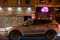 TORONTO, ONTARIO, CANADA - JANUARY 15, 2021: ANTI-LOCKDOWN PROTESTERS DRIVE ALONG DOWNTOWN STREET DURING COVID-19 PANDEMIC.
