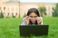 Anti-reflective coating glasses. online education. back to school. teen girl use computer in park. child in glasses with Royalty Free Stock Photo