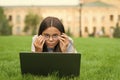 anti-reflective coating glasses. online education. back to school. teen girl use computer in park. child in glasses with Royalty Free Stock Photo