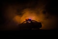 Anti-riot police give signal to be ready. Government power concept. Police in action. Smoke on a dark background with lights. Blue Royalty Free Stock Photo