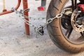 Anti-theft system of the bike. Fasten the bike to the pole Royalty Free Stock Photo