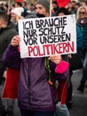 Anti-Vax Covid-19 Demonstrator Holding Sign in Vienna