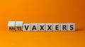 Anti-vaxxers symbol. Turned a cube, changed words `vaxxers` to `anti-vaxxers`. Beautiful orange background. Copy space. Medica Royalty Free Stock Photo