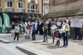 Anti war in Syria protest by men women and children holding banners and placards