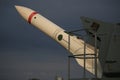 Antiaircraft missile system URAGAN. The missile SAM 9ÃÅ38 against the background of a dark cloudy sky. Closeup Royalty Free Stock Photo