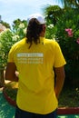 Antibes, France. 26.07.2020 Man in yellow t-shirt team covid. Health care. Character covid protection team for medical