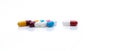 Antibiotic capsule pills on white background. Prescription drugs. Colorful capsule pills. Antibiotic drug resistance concept.