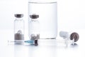 Antibiotic injection bottles with a plastic disposable syringe on a white background Royalty Free Stock Photo