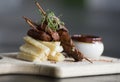 Skewered beef and yuka fries