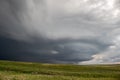 An anticyclonic supercell thunderstorm hangs in the sky over the high plains. Royalty Free Stock Photo